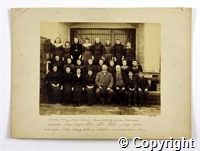 Black and white photograph of a group of of mainly children and young people employed by Belper mills