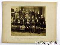 Black and white photograph of a group of mainly female employees of Belper mills