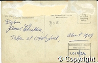 Postcard featuring a black and white photograph of a group of tourists in a horse-drawn carriage taken at Ashford-in-the-Water