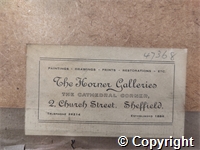 Mounted illustrations of the Rylatt stained glass window (colour) and the top-tracery opening featuring the badge of the Library Association (black and white)