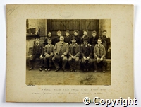 Black and white photograph of a workers from the sixth floor of Belper West Mill