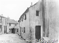 Top of Church street, Buxton. Showing 17th century cottages demolished in 1930s.