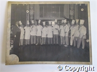 group photograph of chefs having a Christmas celebratory drink