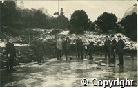 Postcard featuring black and white photograph of men curling on the rink in Pavilion Gardens, Buxton.