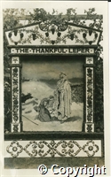 Postcard featuring a black and white photograph of the Higher Buxton well dressing titled The Thankful Leper on the market place in 1933.