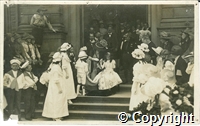 Postcard featuring a black and white photograph showing the well dressing festival queen, Florence Widdowson, and her attendants