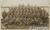 Postcard showing photograph of a group of c.50 soldiers [Granville Hall is believed to be one of them]