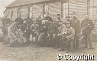 Black and white photograph of soldiers with musical instruments, presumably Munster Prisoner of War Camp 'orchestra'