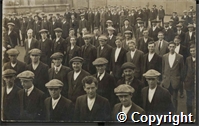 Photograph of large group of First World War enlisted men in civilian dress