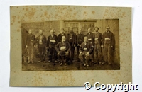 Black and white photograph of a group of mainly men employed at Belper mills