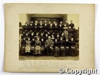 Black and white photograph of a group of mostly female employees of Belper mills