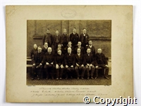 Black and white photograph of a group of mostly male employees of Milford mills